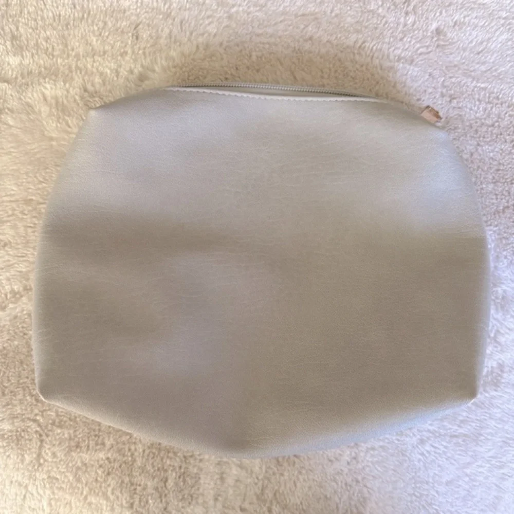 Antik Kraft small gray vegan leather makeup bag/ clutch